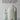 Neben einer Flasche MERME Berlin Milky Drops Face Moisturiser wird ein Glas Milch eingeschenkt. Der deutsche Text neben der Flasche lautet: „Kein Toner, keine Creme: die Milky Drops sind das perfekte Dazwischen.“.